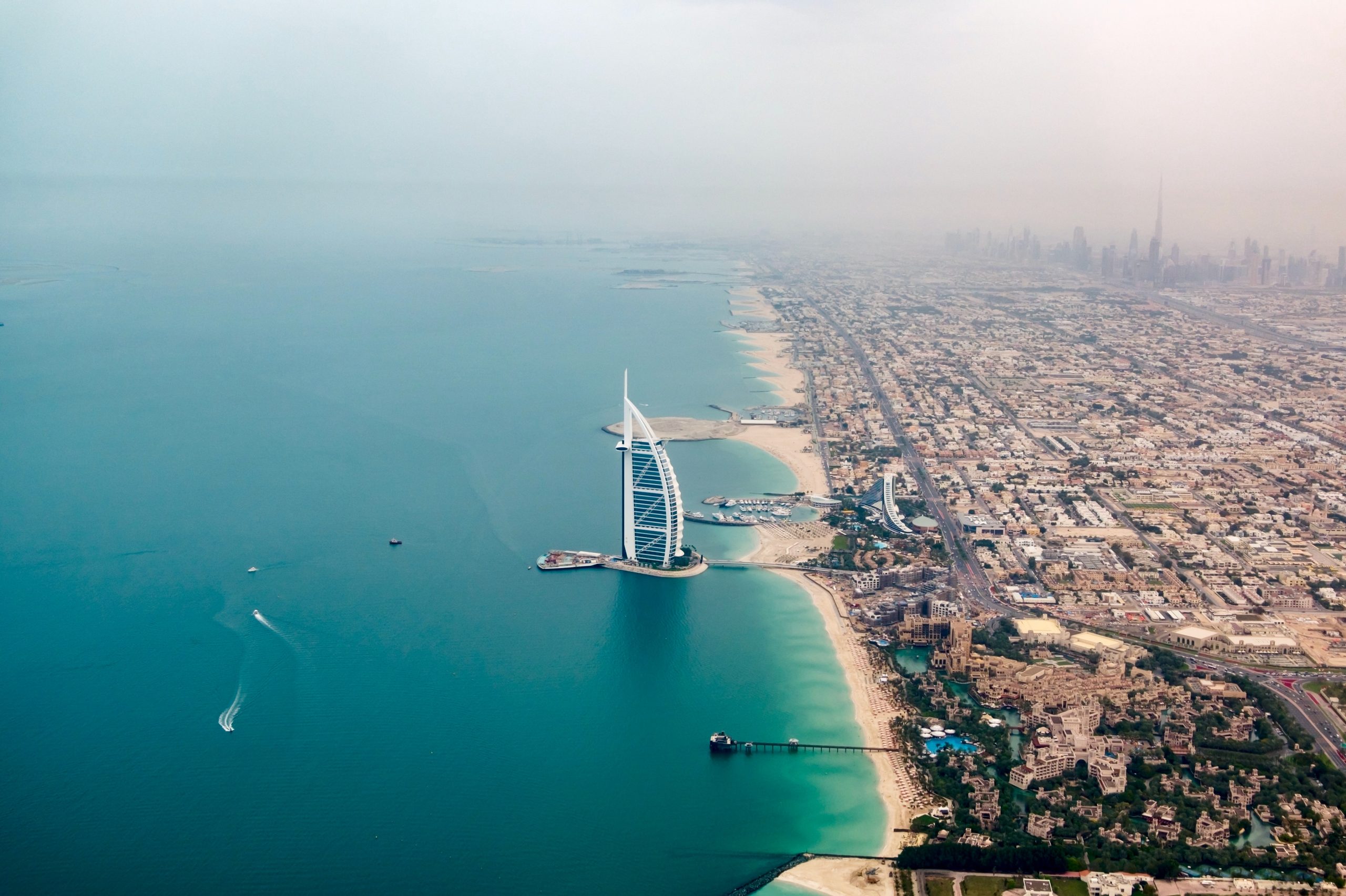 Aerial view of Burj Al Arab along the Jumeirah coastline in Dubai, United Arab Emirates