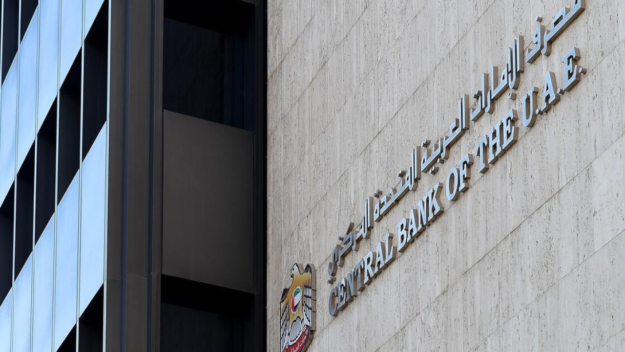 Signage and national emblem on the facade of the Central Bank of the UAE building