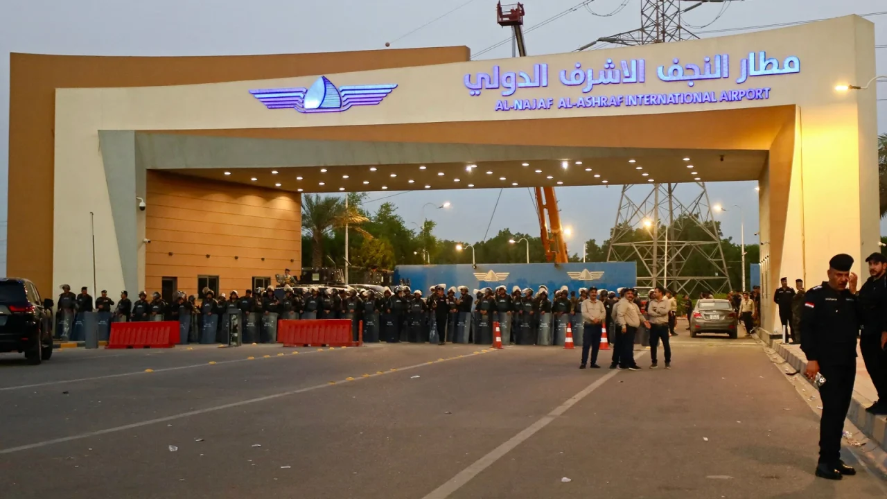 Security forces deployed outside the gate of Al-Najaf Al-Ashraf International Airport
