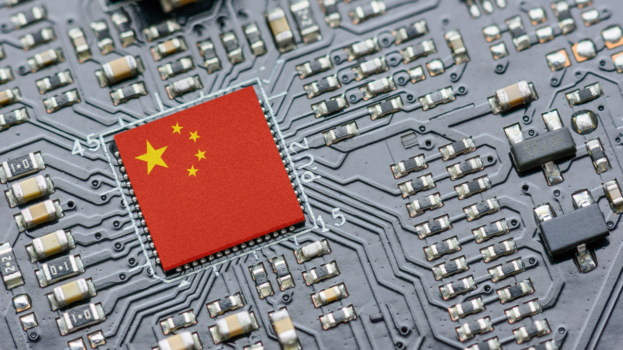 Microchip on a circuit board bearing the flag of China