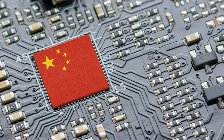 Microchip on a circuit board bearing the flag of China