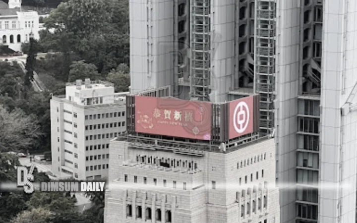 Rooftop of the Bank of China Building in Hong Kong with a New Year greeting billboard
