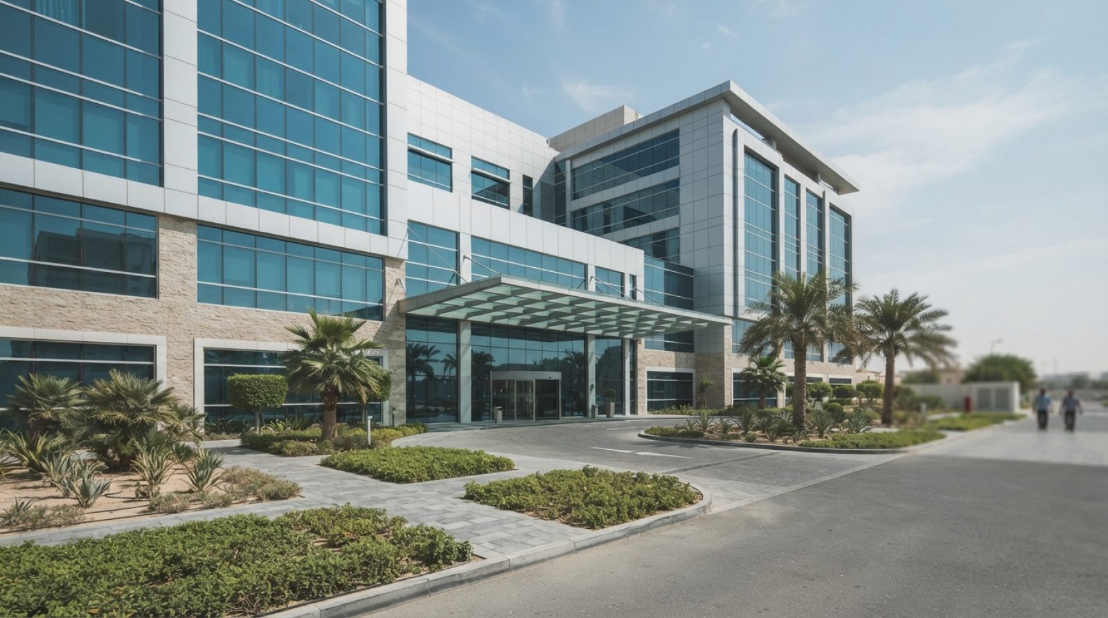 Illustration: A modern glass and steel medical district office building in Dubai Healthcare City under daylight, showing architectural details and cli
