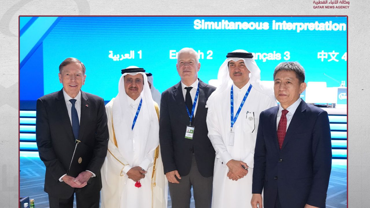 International business and government delegates standing together at a conference